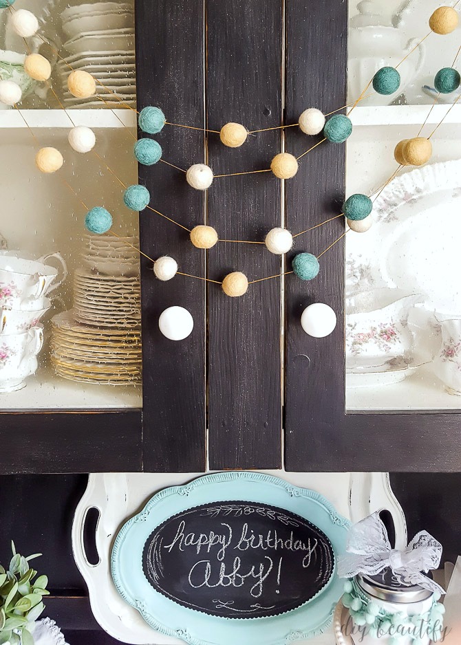 I used vintage decor items to style a shabby modern birthday party, as well as select items from Minted.com!