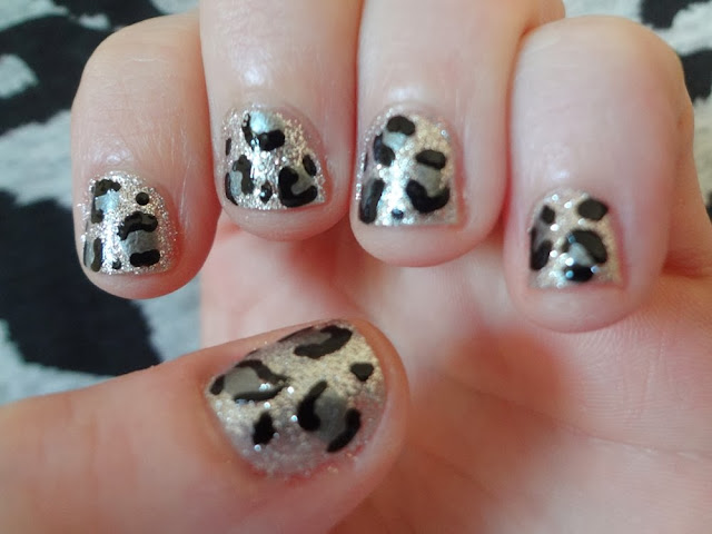 Silver leopard print nails, aka Bailey