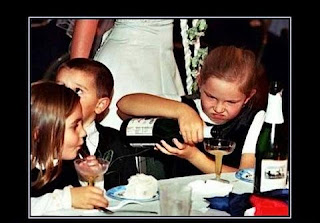 alcoholic children pouring wine at party