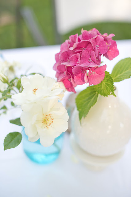 pink hydrangeas and blue canning jars