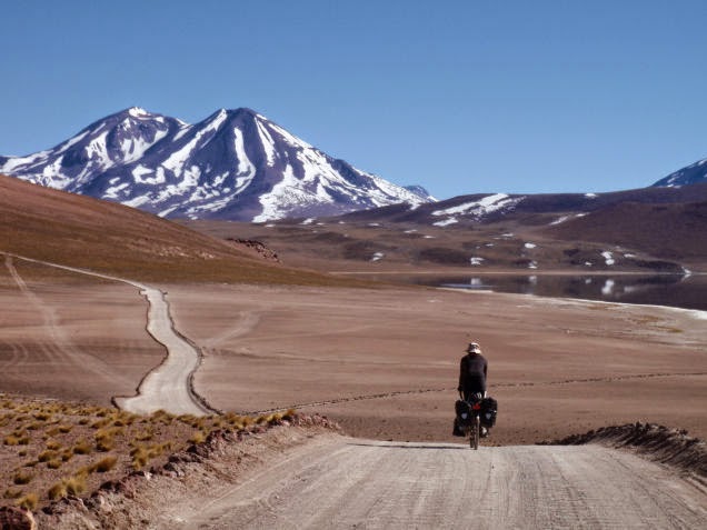 This seems like cyclist nirvana: pedaling slowly across the Atacama Plateau in Chile. - 18 Amazing Places You Should Ride Your Bike Before You Die
