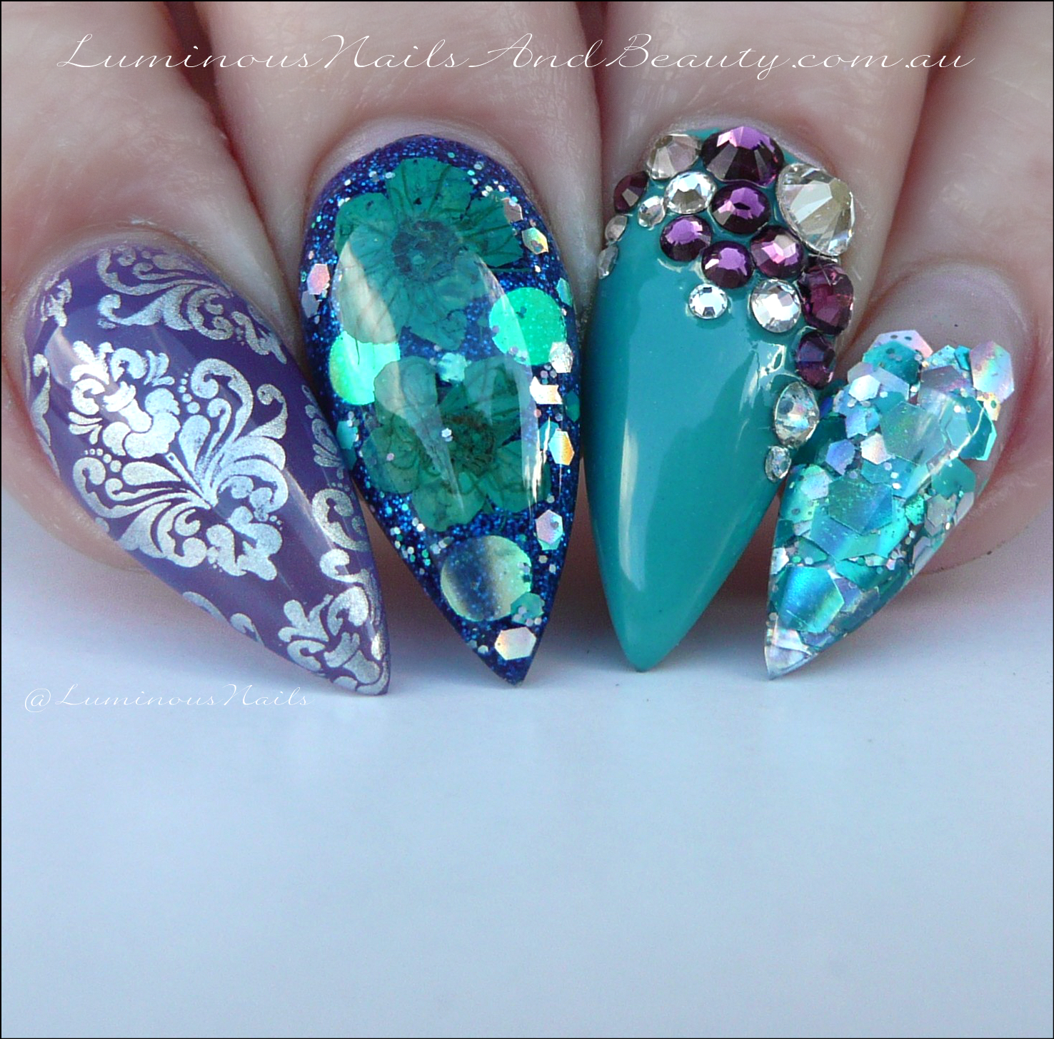 Luminous Nails: Teal, Navy & Purple Acrylic Nails with Dried Flowers ...