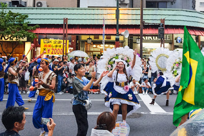 Baiana dancers and jugglers at the 2016 Asakusa Samba Festival, Tokyo, Japan. Jugglers and baianas at the 2016 Asakusa Samba Festival, Tokyo, Japan.