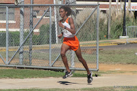 FAMU's ace distance runner, Shuaib Winters, leads the field of the 2011 Bobby Lang Invitational 8K with 100 meters to go. Shuaib Winters