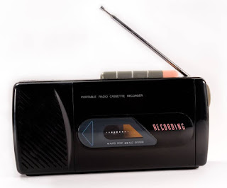 An old plastic battery-operated radio and cassette player, circa 1970s.