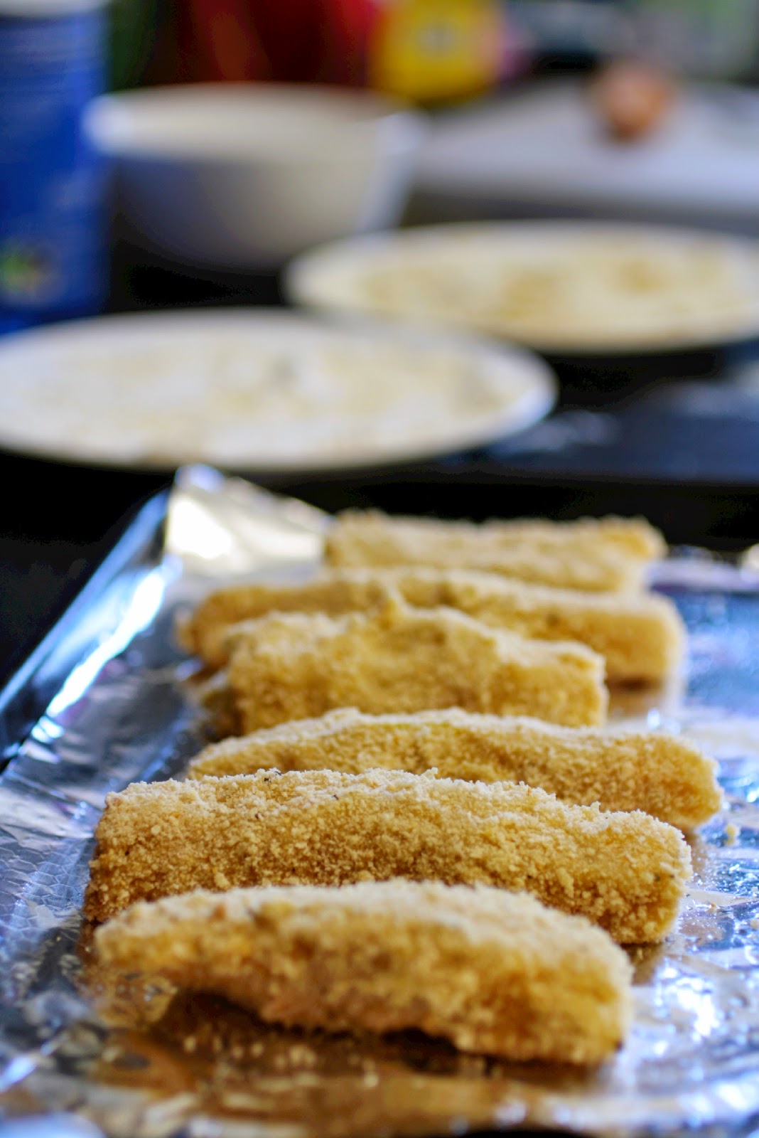 Home made baked fish fingers - using smoked haddock adds a more grown up taste to these fish sticks that kids (and big kids!) will both love and baking them is far healthier than frying!
