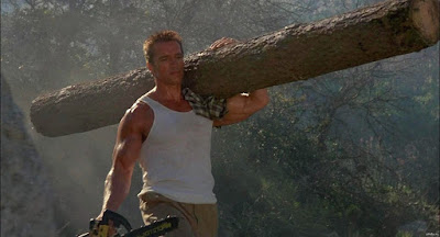 Arnold Schwarzenegger carries a large trunk on his left shoulder. (Commando, 1985)