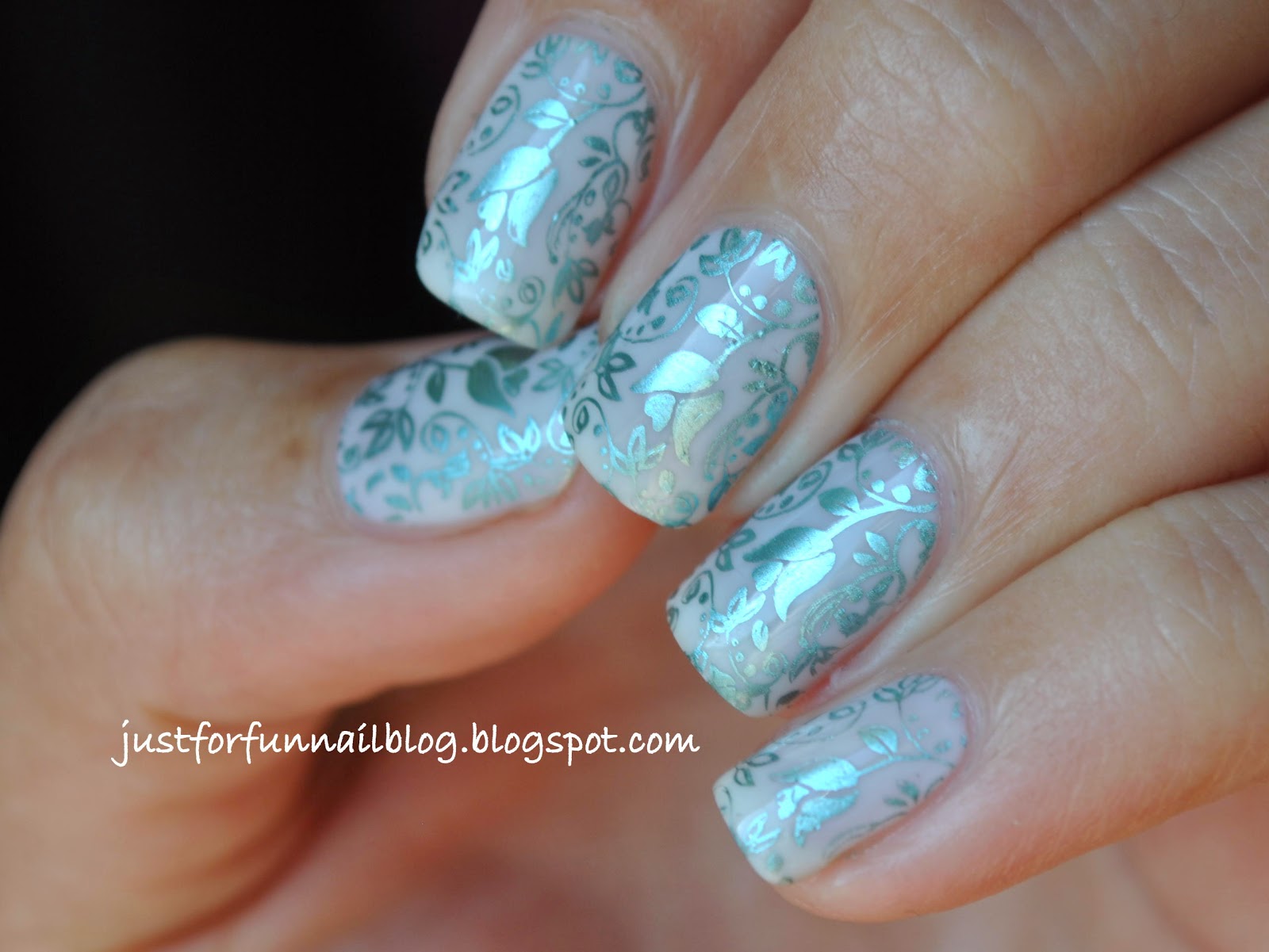 Turquoise flower stamping over white delicate base
