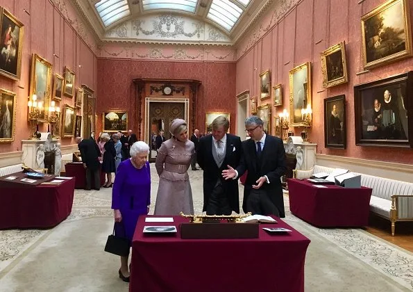 Queen Elizabeth II, Prince Charles and Camilla, Duchess of Cornwall. state banquet at Buckingham Palace. Maxima wore a new jacket by Claes Iversen