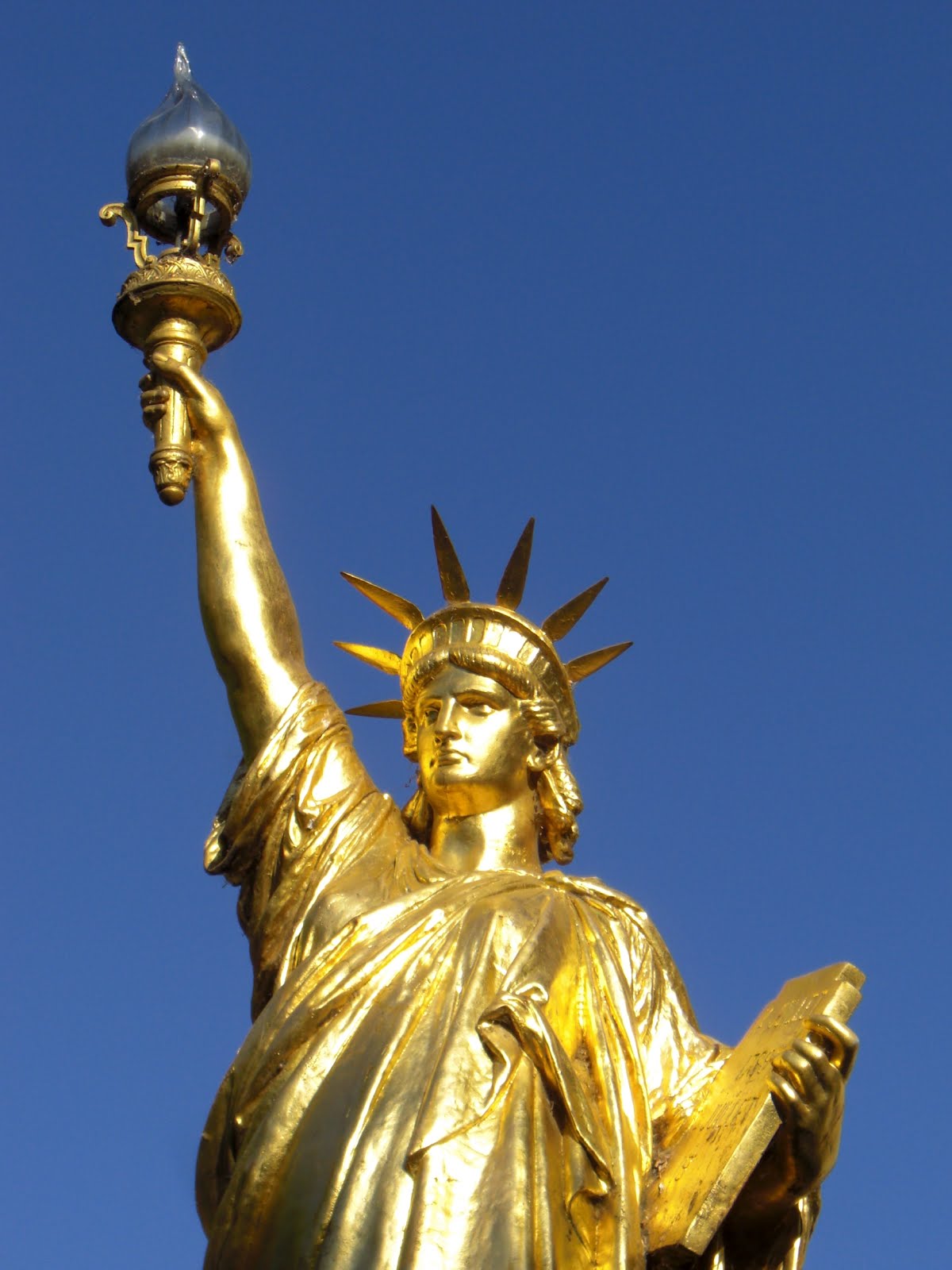 Statue Of Liberty Garment Crossword