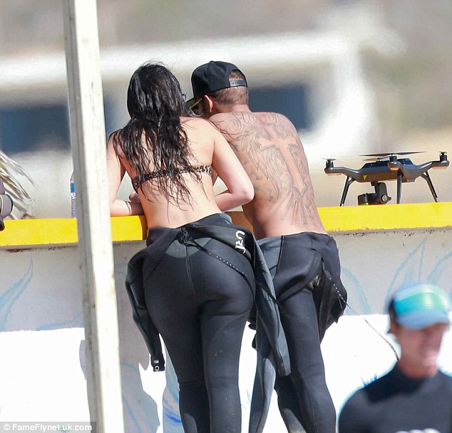 Lewis hamilton surfs with friends including a mystery brunette at mexico bi...