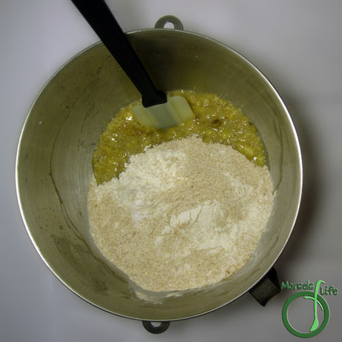 Morsels of Life - Roasted Banana Bread Step 5 - Combine Wet Team and Dry Team. Pour into a greased loaf pan, and top with oatmeal if desired. Bake at 350F for 45 minutes.