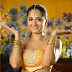 Rudhramadevi Ansuhka Hot and Sexy Unseen Navel  In Two Piece Yellow Dress Photos