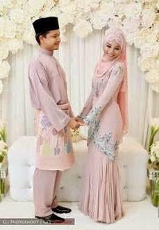 Desain baju pengantin muslim modern dengan warna soft elegan Desain baju pengantin muslim modern dengan warna soft elegan