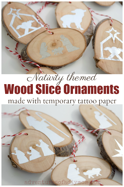 nativity themed wood slice ornaments made with temporary tattoo paper