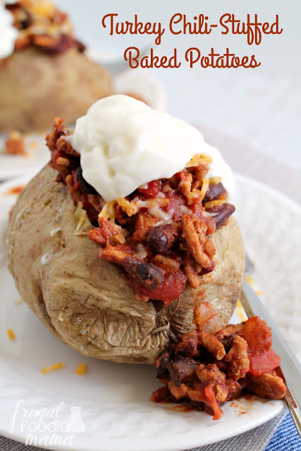 Hearty baked potatoes are simply steamed in the microwave, & then topped with a homemade chili that's packed with turkey and beans in these Turkey Chili-Stuffed Baked Potatoes.