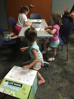 children coloring at 7th Gen Healthy Baby Home Party