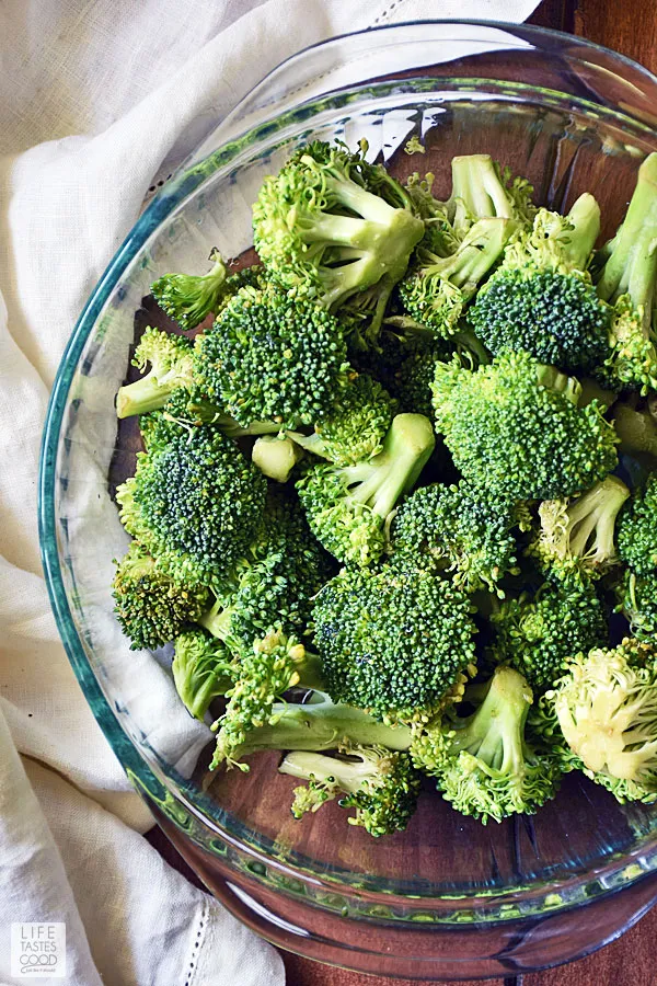 Fresh broccoli in microwave safe glass bowl to show how to steam broccoli in the microwave