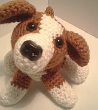 http://www.ravelry.com/patterns/library/lily-baby-beagle-amipal-amigurumi-stuffed-puppy-dog