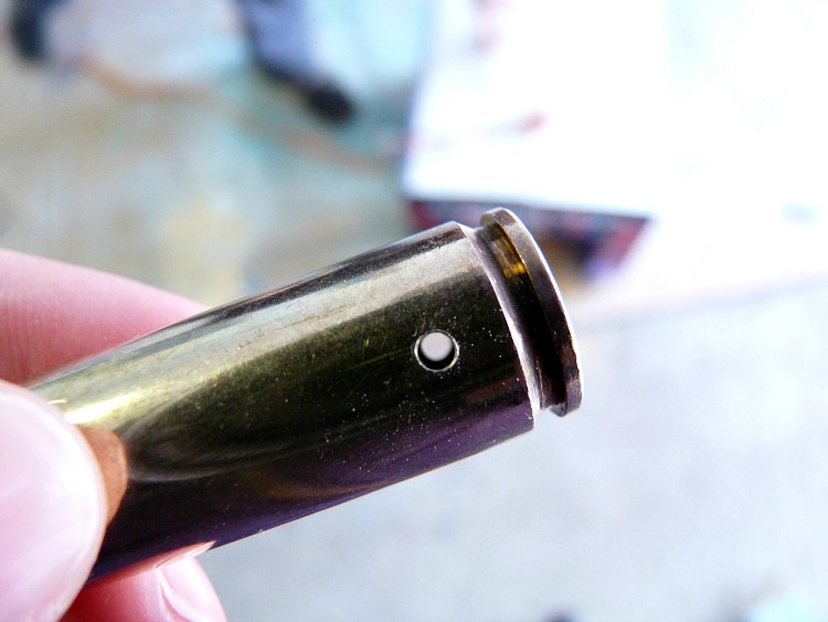 Drill a hole in a bullet casing