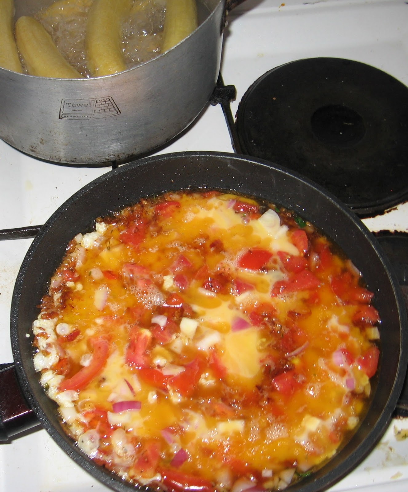 Boiled Plantain With Mint Leaves In Tomato Egg Sauce