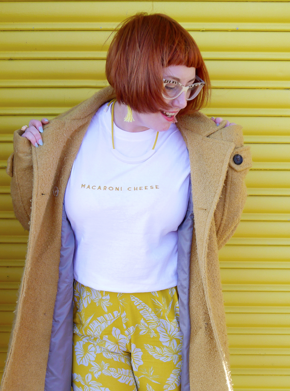 Wearing Yellow from head to toe Yellow street style outfit featuring tropical print trousers