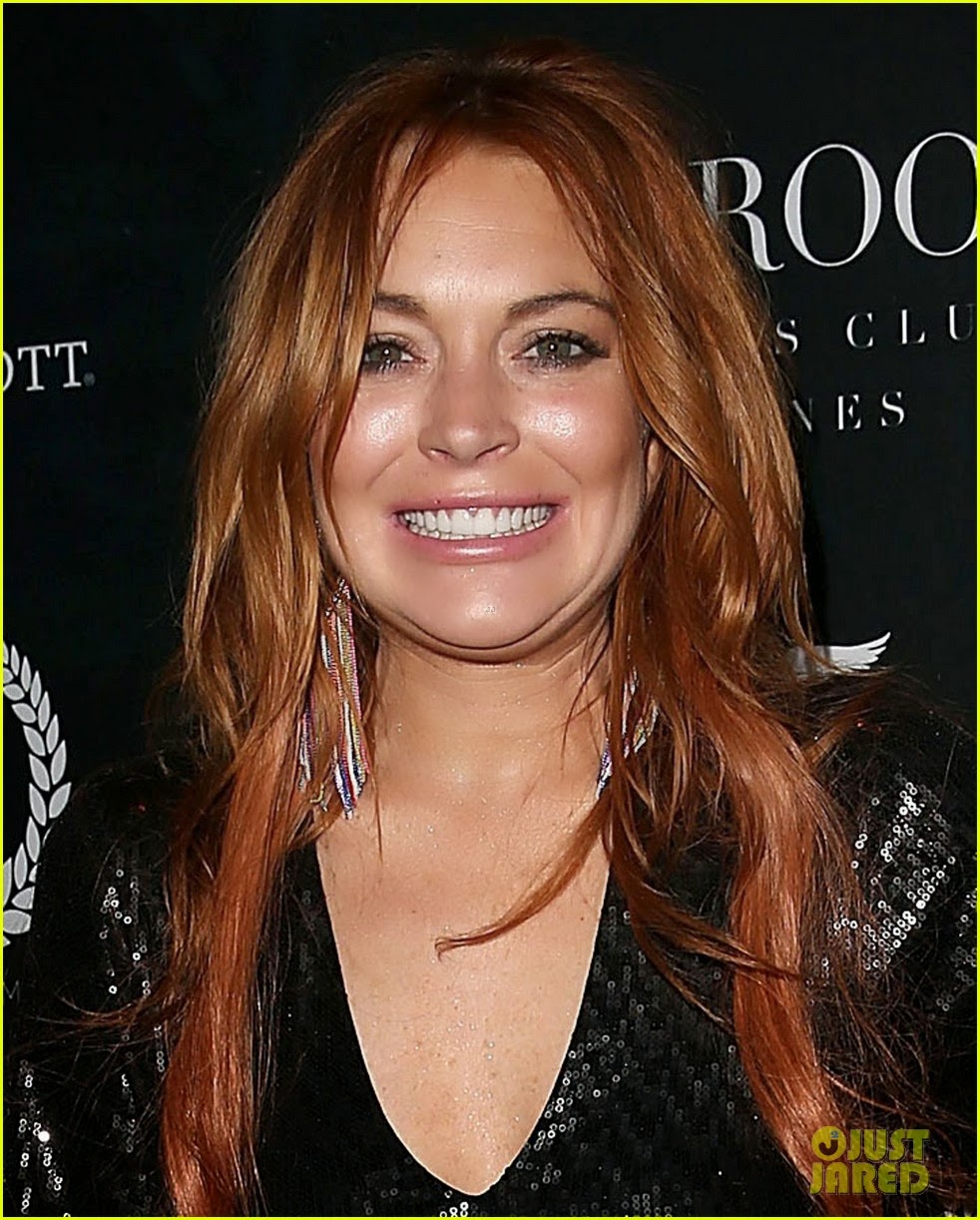 Celeb Diary: Lindsay Lohan walks the carpet while attending the VIP