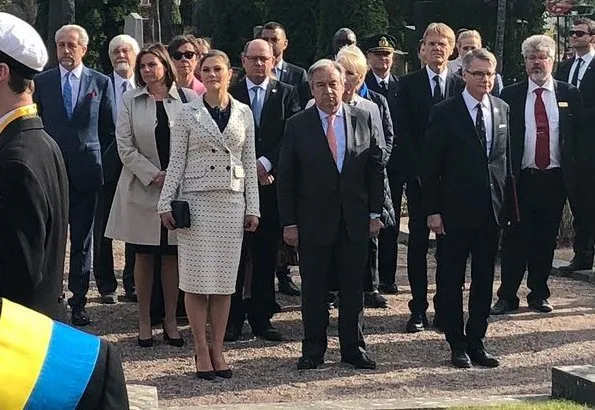 Crown Princess Victoria carried Quidam Clutch, wore Gant Vertical Striped Bow Blouse, and Alexander McQueen double-breasted printed blazer and skirt