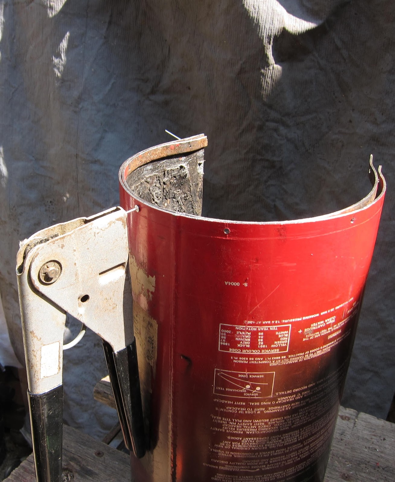 Fire extinguisher wood stove