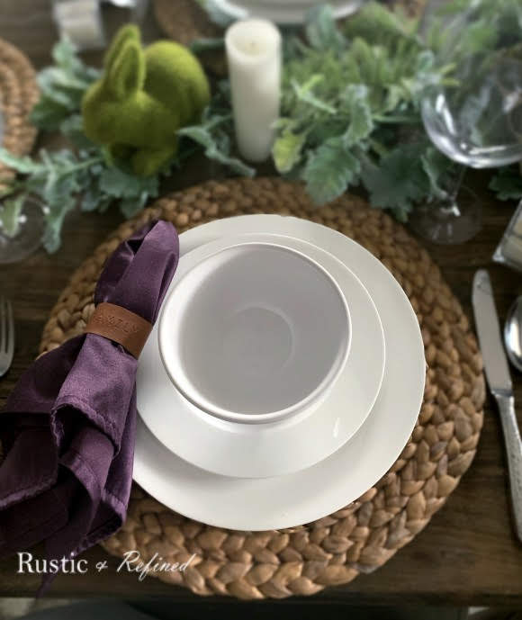 Gorgeous tablescape with rustic touches and spring color using everyday dishes.