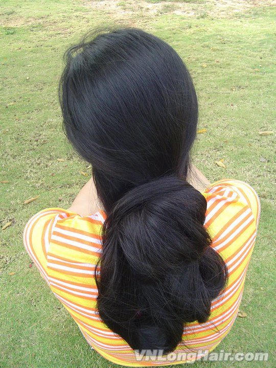 Thick huge long hair bun made by Indian Rapunzel Amrita. 