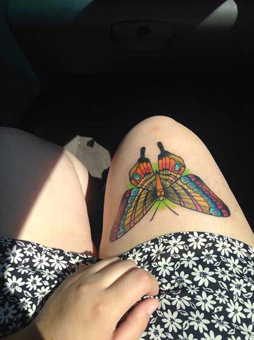 kadın üst bacak renkli kelebek dövmesi woman thigh colorful butetrfly tattoo kadın üst bacak renkli kelebek dövmesi woman thigh colorful butetrfly tattoo