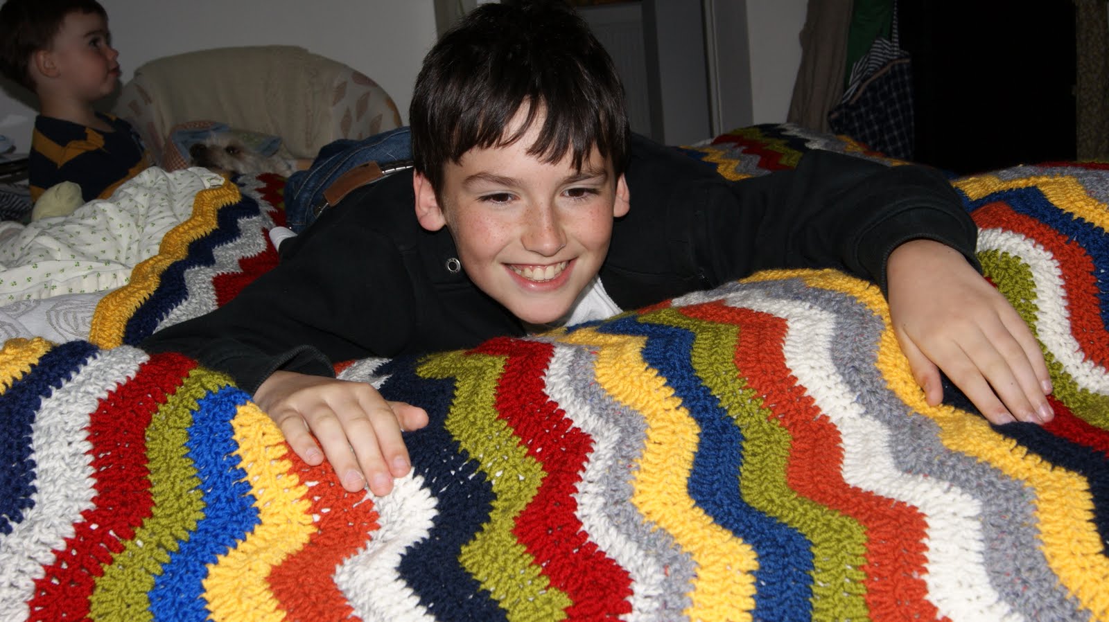 Ravelry: Ripple Blanket pattern by Bernat Design Studio
