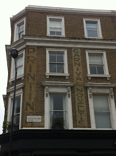 Ghost sign on Kensington Park Road, London W11