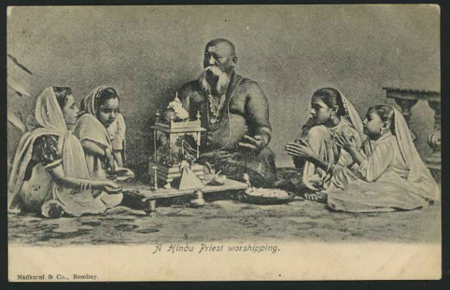 A-Hindu-Priest-Worshipping-God-with-Girls