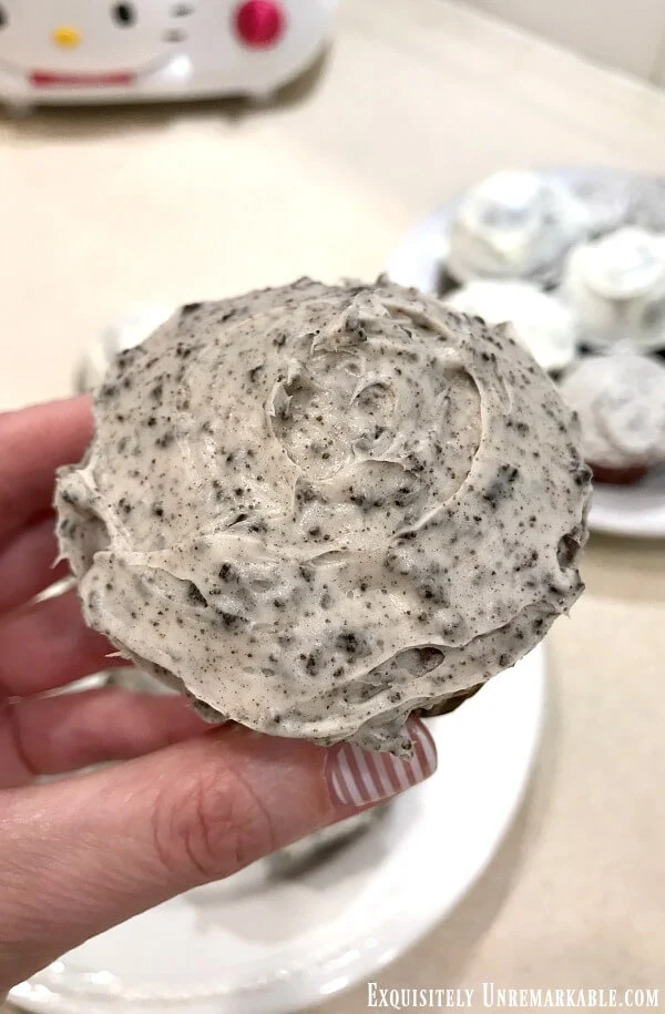 Oreo Cookie Cupcake With Oreo Frosting in hand