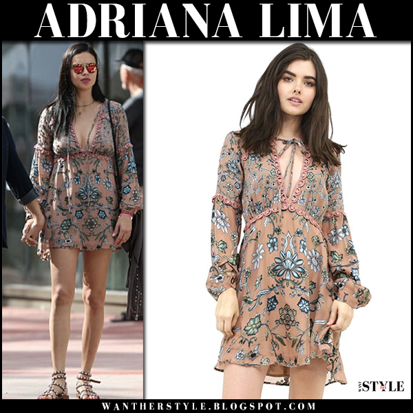 Adriana Lima in floral print mini dress and sandals in Miami on