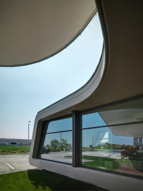 Window of the Gazoline Petrol Station by Damilano Studio Architects as seen from outside
