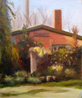 Oil painting of a building with a low-gabled roof and chimney, with a tall fence in the foreground overgrown with trees and shrubs.