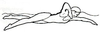 Freestyle Reach Freestyle Reach: Image of woman swimming freestyle reaching with her left arm under the water and her right arm entering the water at her ear