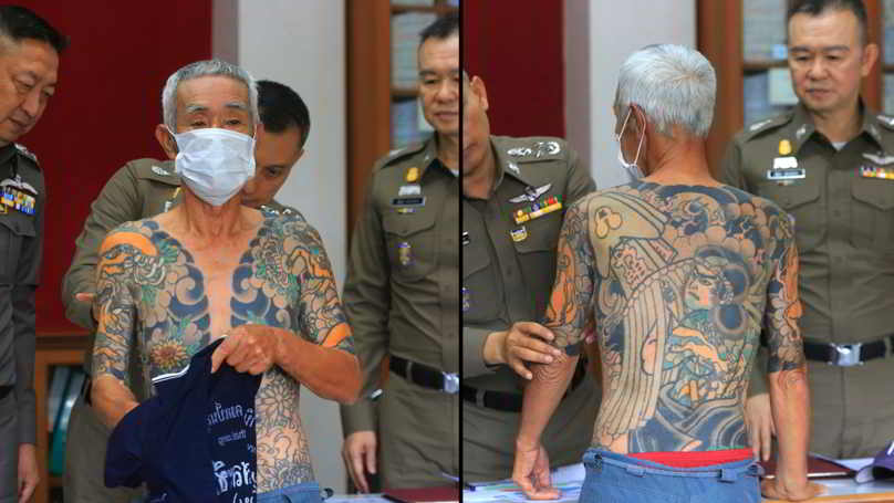 Miembro de la yakuza tatuado siendo arrestado