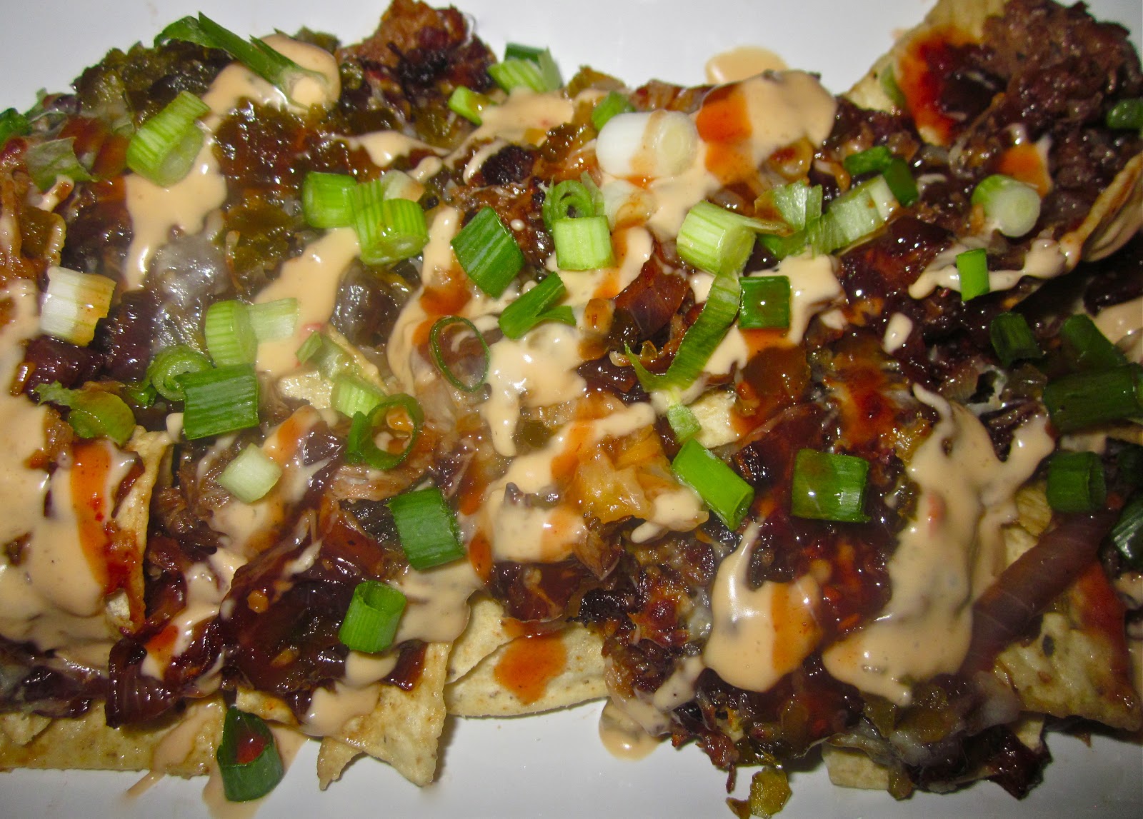 Haute + Heirloom Title Town's Famous BBQ Nachos with Pulled Pork, Pan