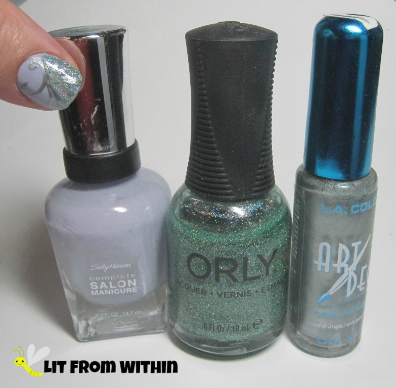 Bottle shot:  Sally Hansen Salon I Lilac You, Orly Sparkling Garbage, and a silver striper.