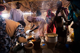 African cooking in Rwanda camp for internally displaced people