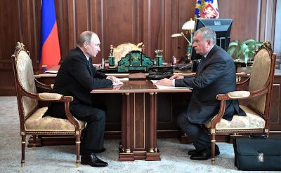 Russian President Vladimir Putin and Rosneft CEO Igor Sechin.