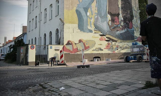 Street Art By Spanish Artist Aryz For Positive Propaganda In Munich, Germany. 7