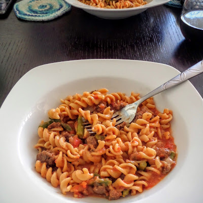 Turkey and Asparagus Skillet Pasta:  A one dish meal of turkey Italian sausage and asparagus, with pasta in tomato sauce, plus cheese all cooked in only one skillet.