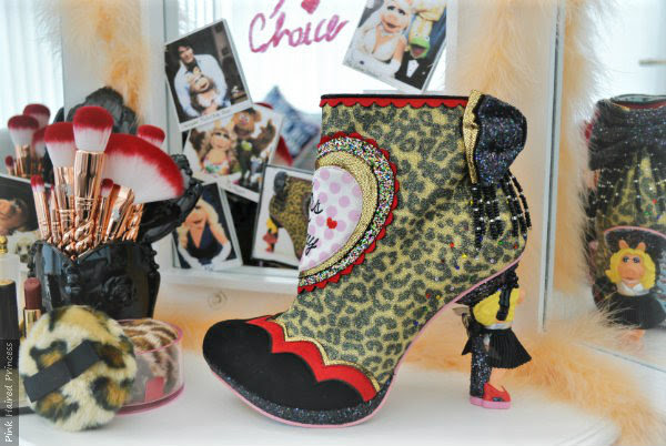 Irregular Choice Disney Muppets Fierce Piggy boot Irregular Choice Disney Muppets Fierce Piggy leopard print boots on vanity unit with makeup and mirror