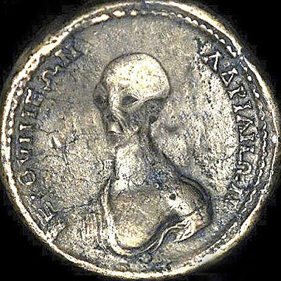 This ancient coin seems to show the head and shoulders of an alien being.