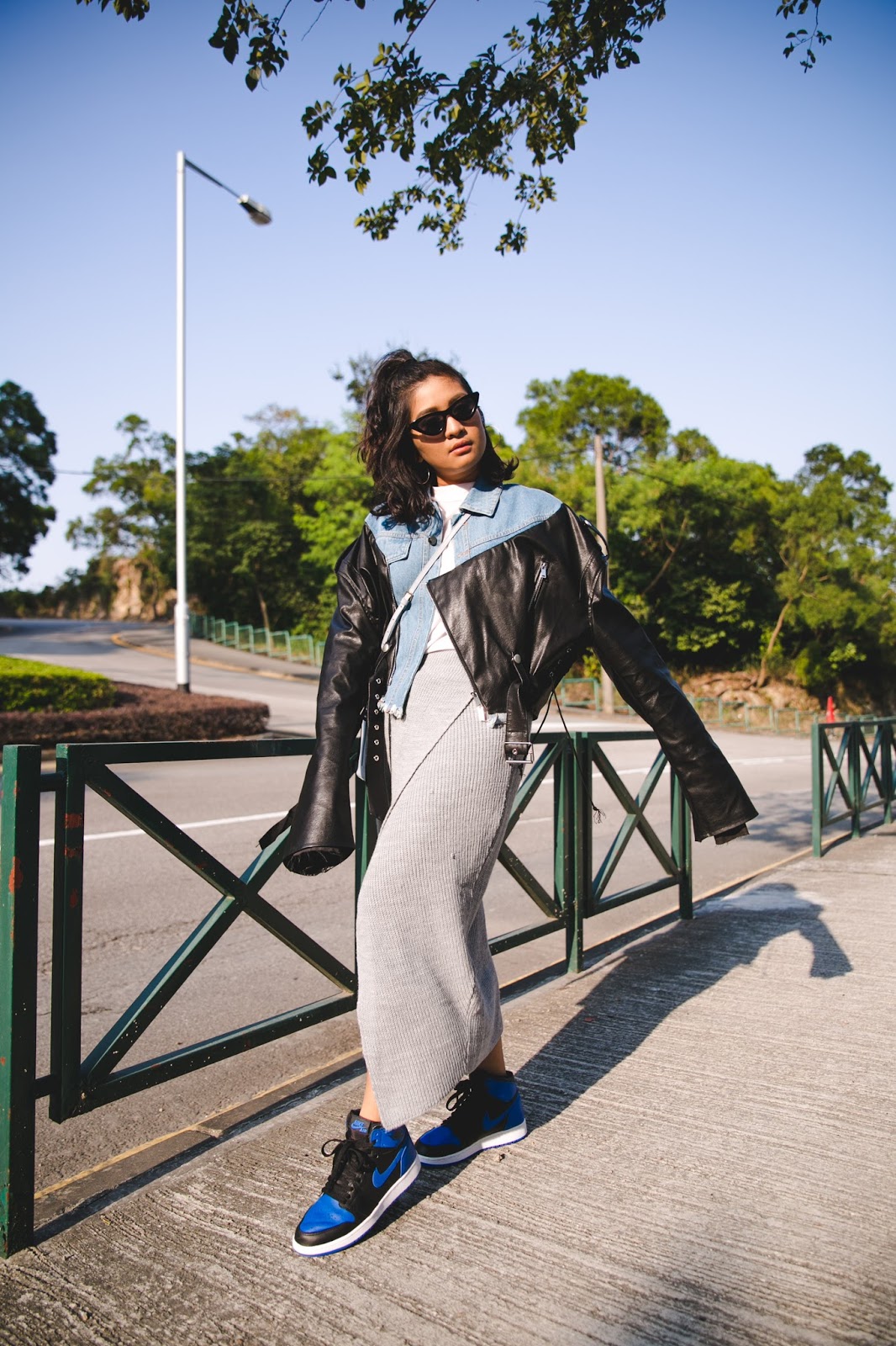 macau fashion blogger wearing denim and leather jacket
